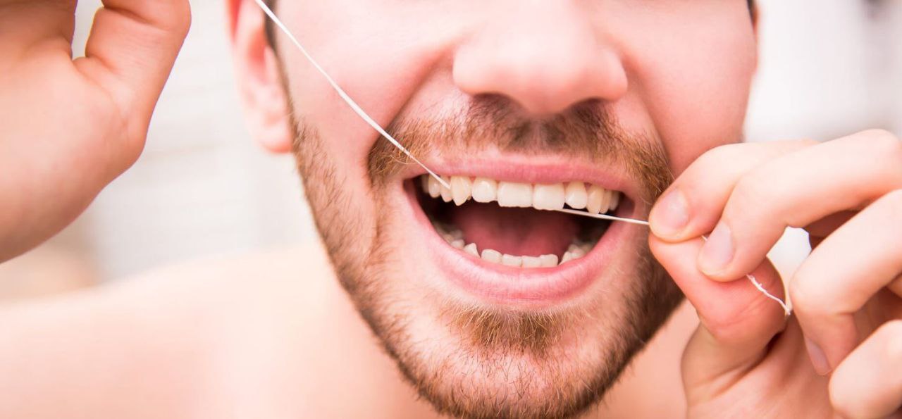 25 ноября - день чистки зубов зубной нитью